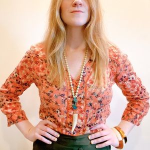 Burnt orange floral print blouse